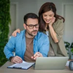 Arizona homebuyers reviewing mortgage information and home purchase costs