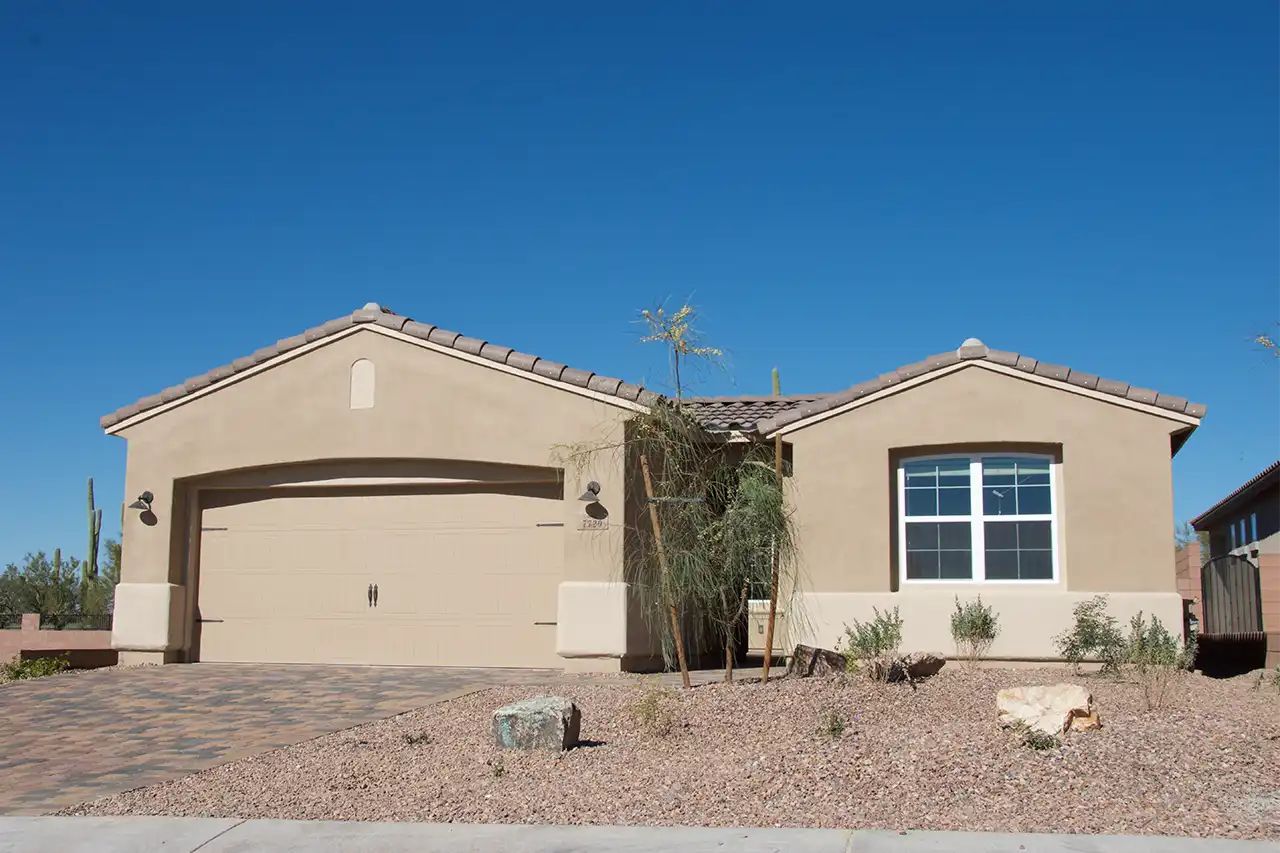Single-story Arizona home with stucco exterior and desert landscaping